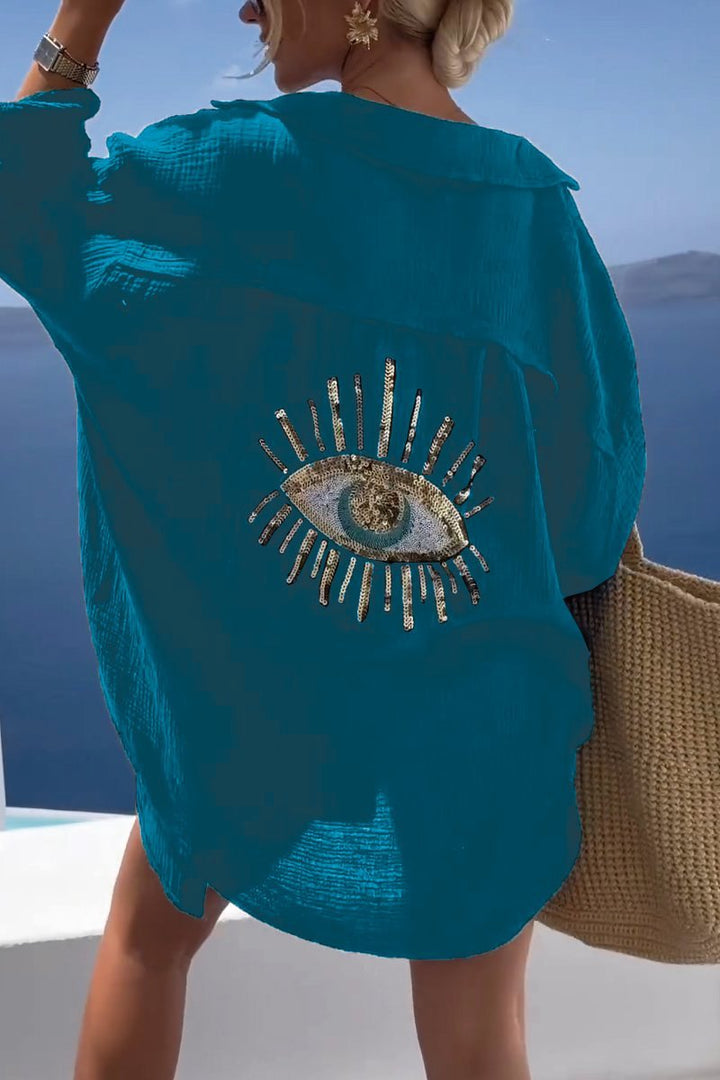 Lange mouwen dames top, losse pasvorm, perfect als zomerblouse voor strand of vakantie.