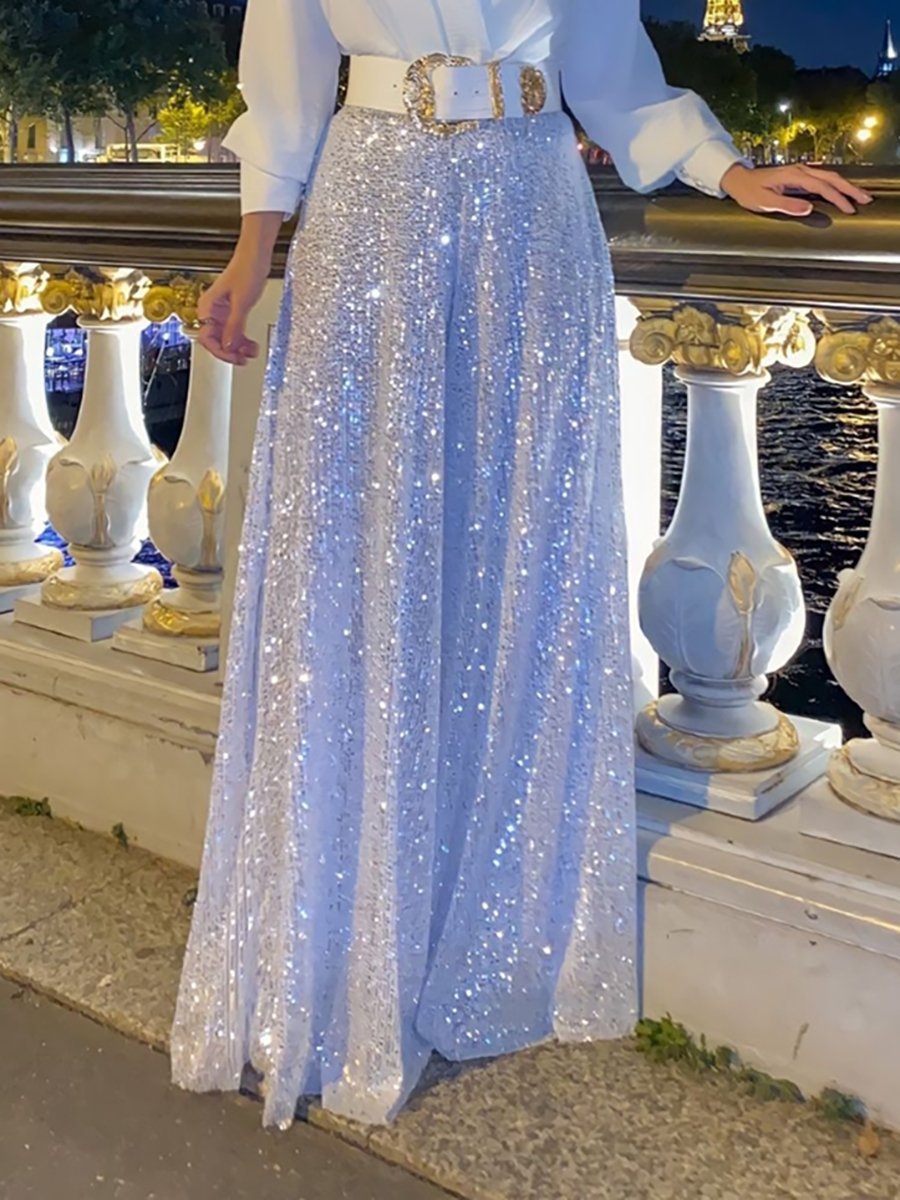Luxe dames glitterjurk, ideaal voor een avondje uit of gala. Beschikbaar in zwart en wit.