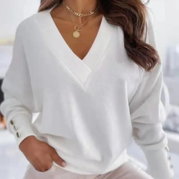 Stijlvolle dames V-hals trui met perfecte pasvorm. Comfortabele katoen mix voor elegante casual winterkleding.