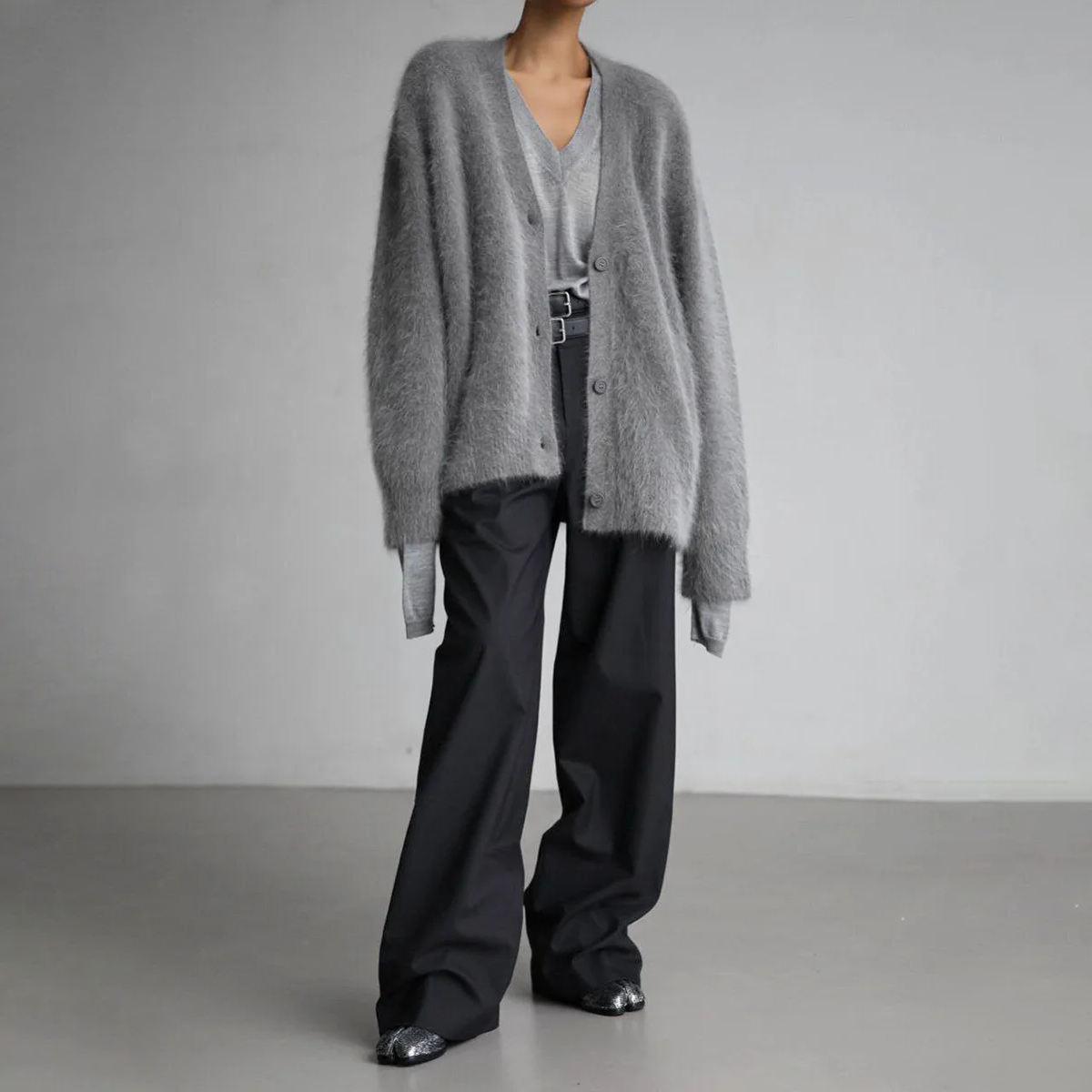 Kasjmier V-hals vest dames, elegant met knopen, oversized pasvorm, zachte stof, veelzijdig voor casual en nette gelegenheden.
