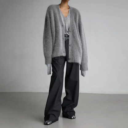 Kasjmier V-hals vest dames, elegant met knopen, oversized pasvorm, zachte stof, veelzijdig voor casual en nette gelegenheden.