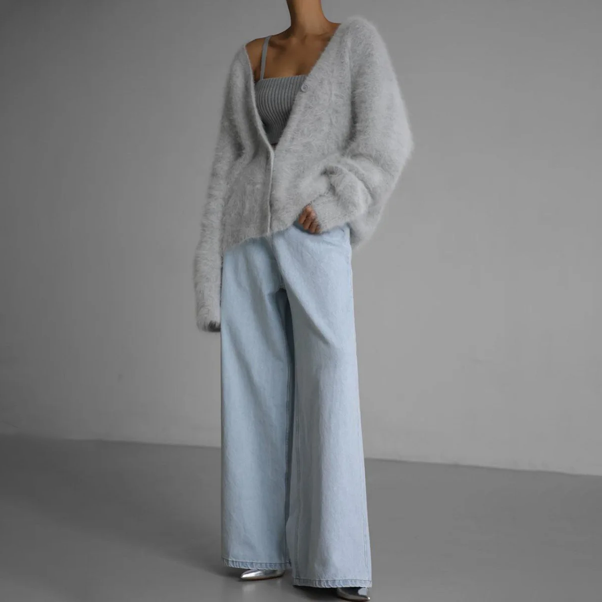 Kasjmier V-hals vest dames, elegant met knopen, oversized pasvorm, zachte stof, veelzijdig voor casual en nette gelegenheden.