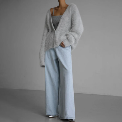 Kasjmier V-hals vest dames, elegant met knopen, oversized pasvorm, zachte stof, veelzijdig voor casual en nette gelegenheden.