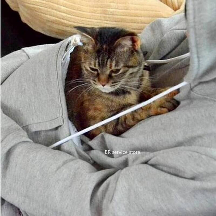 Zachte unisex hoodie met innovatieve kattenzak, ontworpen voor comfortabel dragen van je kat. Knus & stijlvol.