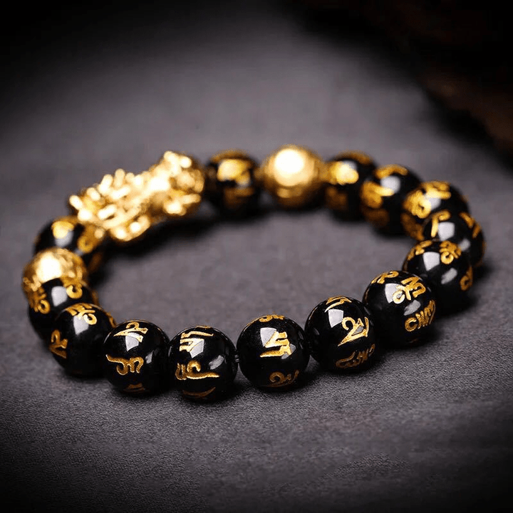 Elegante unisex Pi Xiu armband van gepolijste zwarte obsidiaan. Krachtig sieraad voor geluk, rijkdom en bescherming.