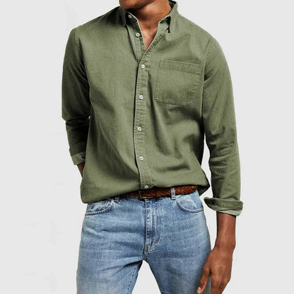 "Klassiek herenoverhemd van hoogwaardige katoen in diverse kleuren, perfect voor zakelijke en casual gelegenheden."