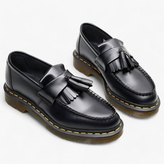 Klassieke loafers met kwastje, tijdloos design, lederen afwerking, geschikt voor zowel casual als formele gelegenheden.