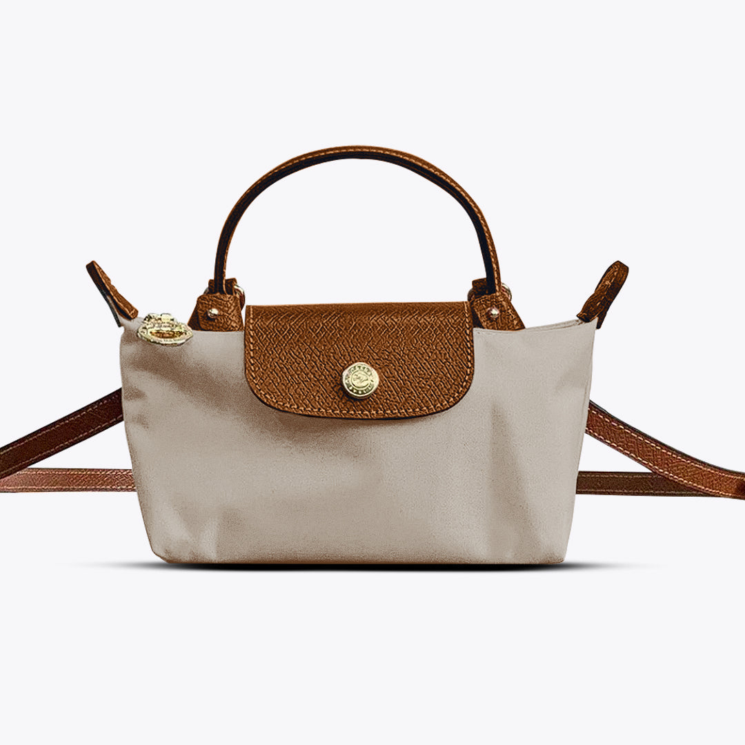 Veelzijdige dames schoudertas met verstelbare PU riem. Ideaal als kleine handtas of kruistas voor dagelijks gebruik.