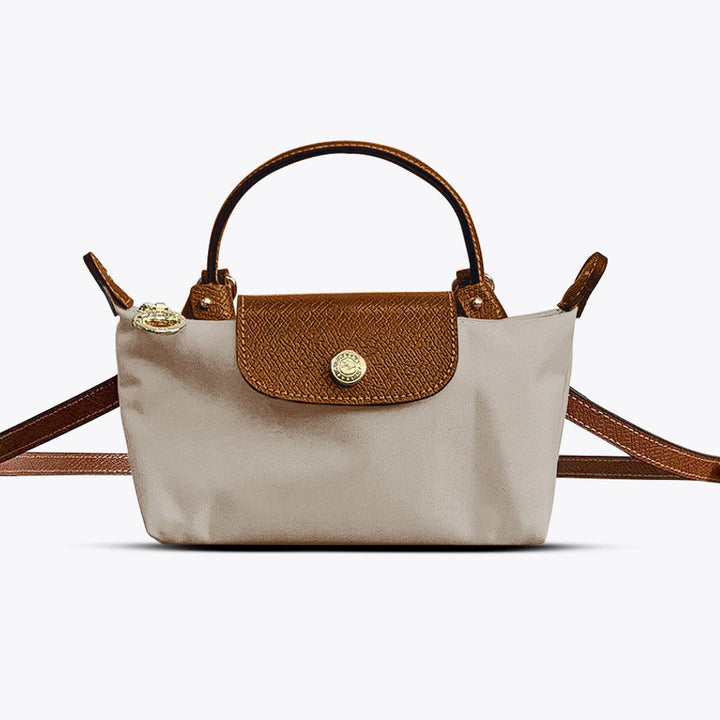 Veelzijdige dames schoudertas met verstelbare PU riem. Ideaal als kleine handtas of kruistas voor dagelijks gebruik.
