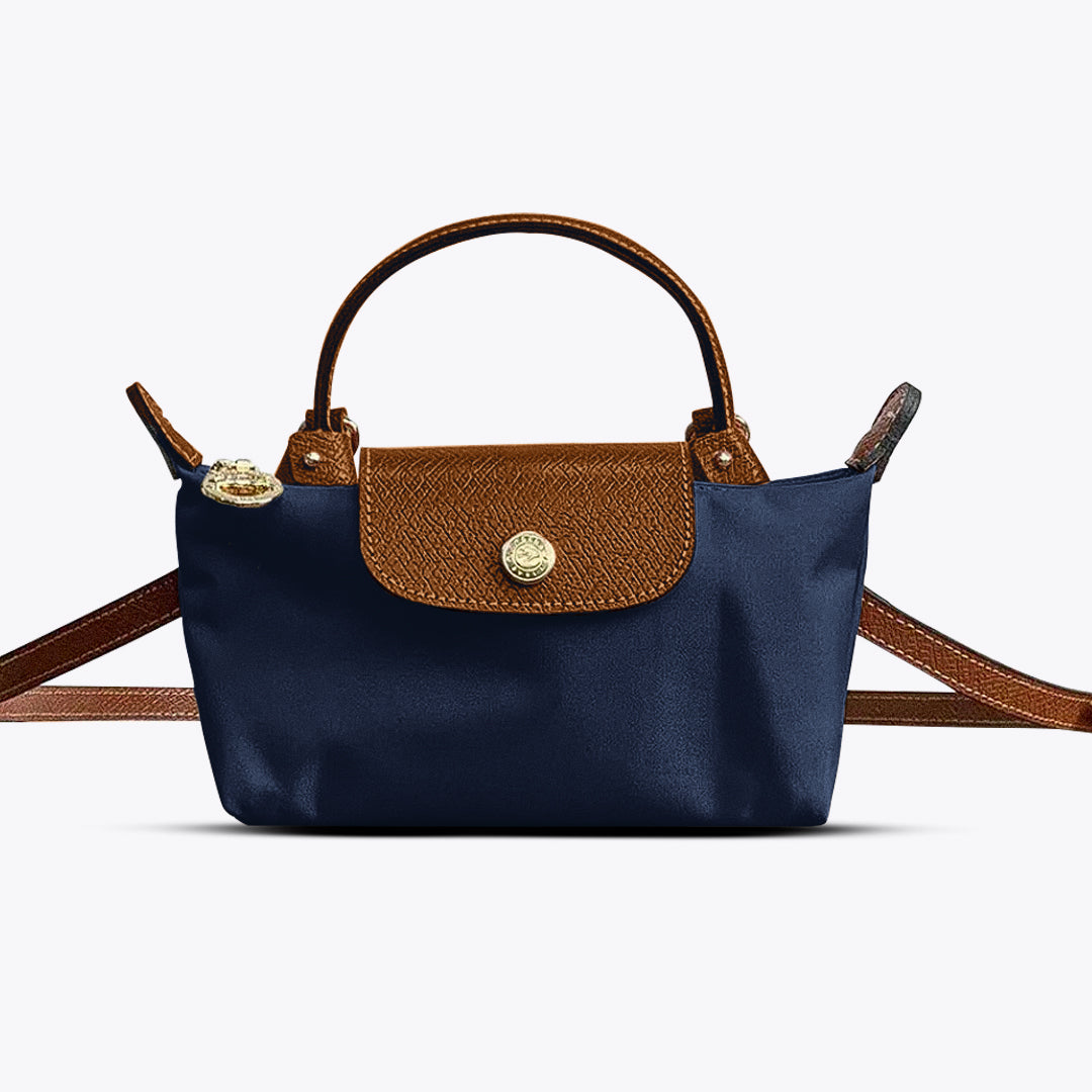 Klassieke kleine dames tas, ideaal als mini kruistas. Chique kunstleer accessoire voor elke gelegenheid.