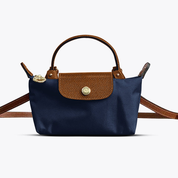 Klassieke kleine dames tas, ideaal als mini kruistas. Chique kunstleer accessoire voor elke gelegenheid.