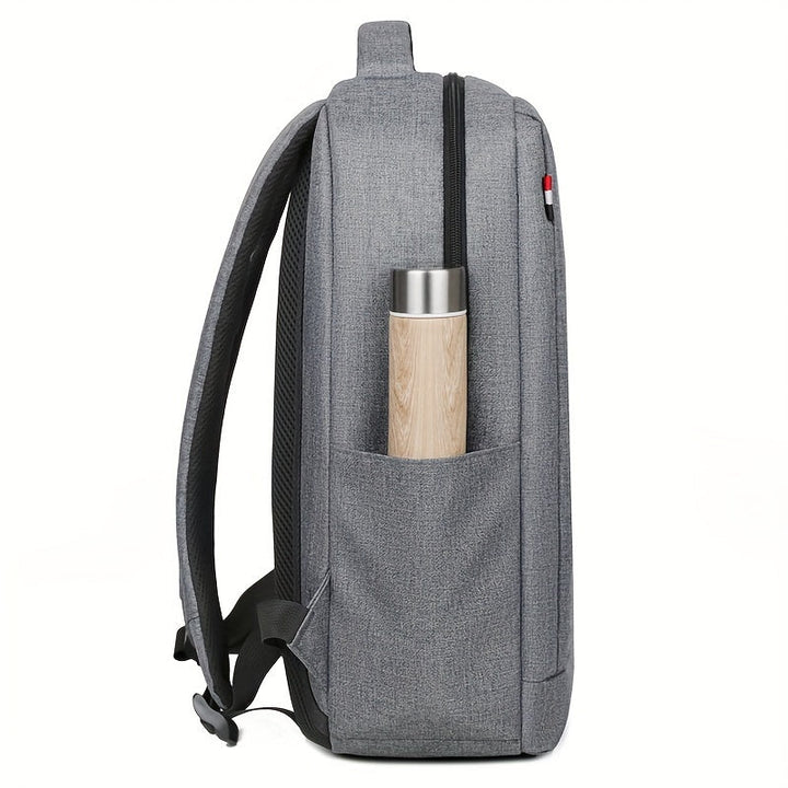 Unisex laptoprugzak, grijs van kleur, voor werk en school. Organiseer je spullen gemakkelijk en stijlvol.