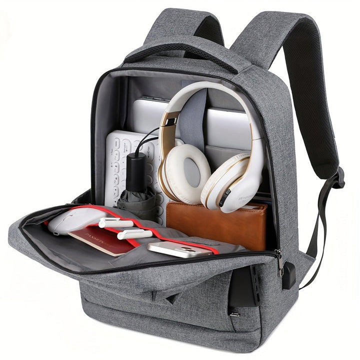 Grijze multifunctionele unisex rugzak, perfect voor laptops. Biedt organisatie en draagcomfort voor elke dag.