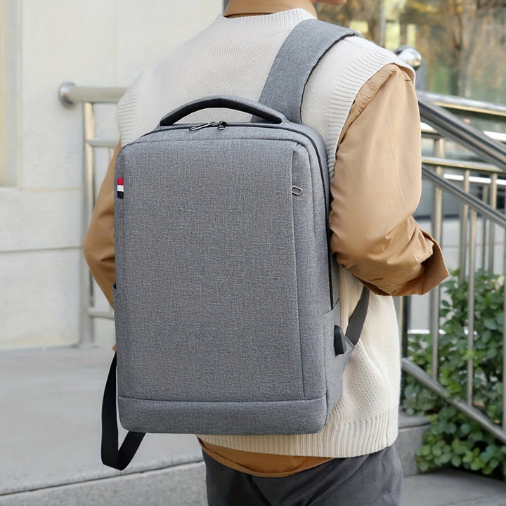 Grijze multifunctionele reisrugzak voor laptops. Handige vakken voor accessoires, optimaal georganiseerd.