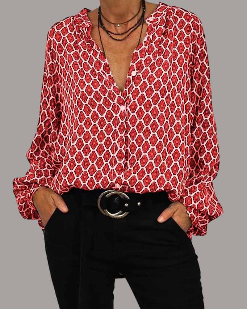 Stijlvolle damesblouse met modieus geometrisch patroon en klassieke V-hals, veelzijdig en trendy.
