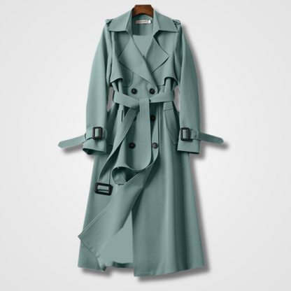 Lange dames trenchcoat met klassieke reverskraag en dubbele knoopsluiting, verkrijgbaar in diverse kleuren voor elegantie.