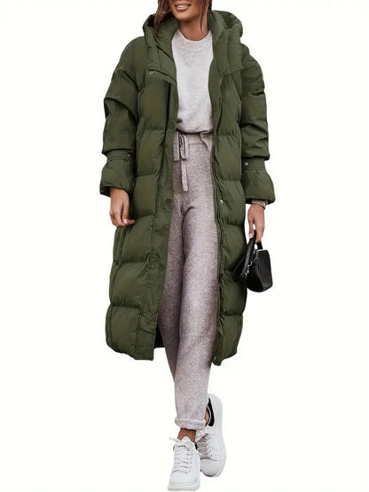 "Lange dames winterjas met waterdicht teddy design, ademende stof en elegante uitstraling, ideaal voor koud weer."