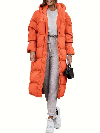 "Lange dames winterjas met waterdicht teddy design, ademende stof en elegante uitstraling, ideaal voor koud weer."