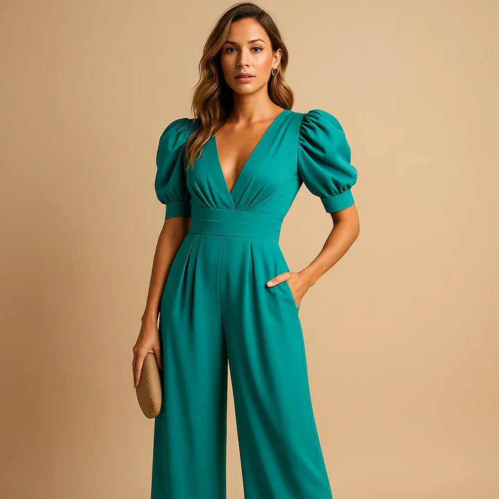 Formele dames jumpsuit met stijlvolle pofmouwen, een trendy keuze voor avondkleding en chique evenementen.
