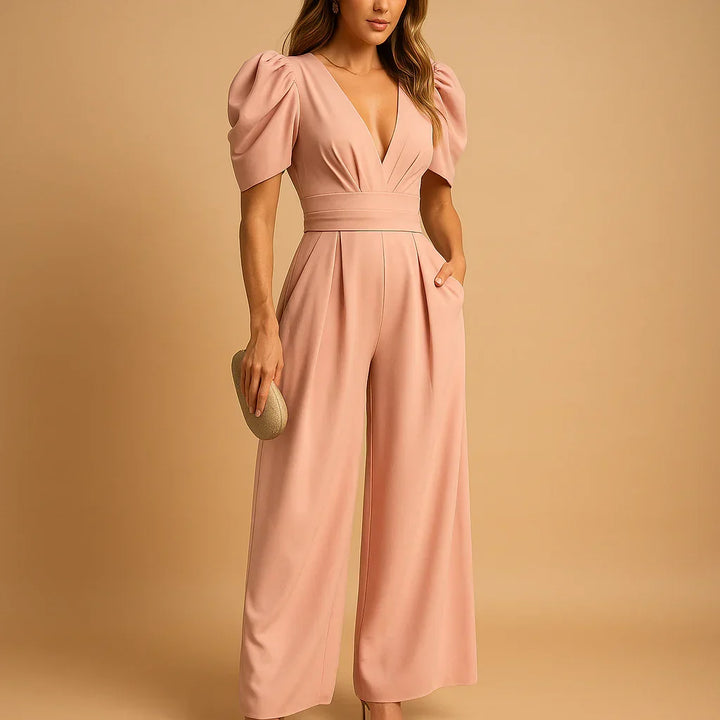 Elegante dames jumpsuit met chique pofmouwen, perfect voor formele gelegenheden of als avondkleding.