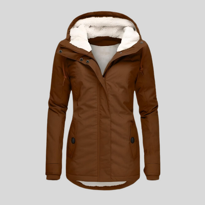 "Lange winterjas, waterdicht, met capuchon en zachte voering voor dames, biedt style en bescherming voor koud weer."