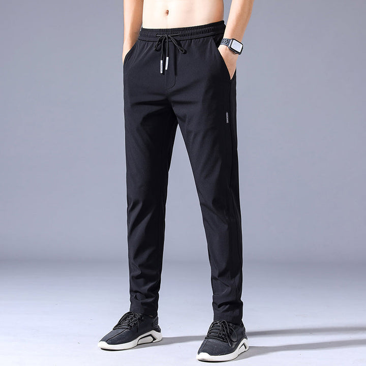 Dunne elastische heren joggingbroek, ideaal voor comfort en stijl; perfecte vrijetijdsbroek.