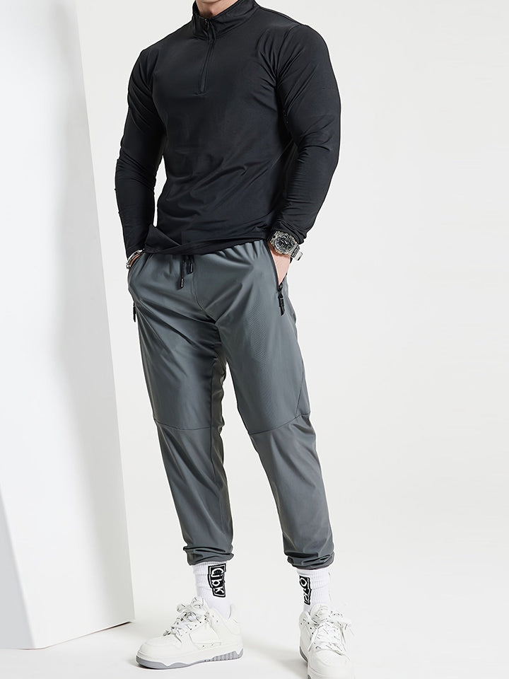 Casual heren T-shirt: slim-fit henleyshirt met lange mouwen, opstaande kraag en moderne halve rits.