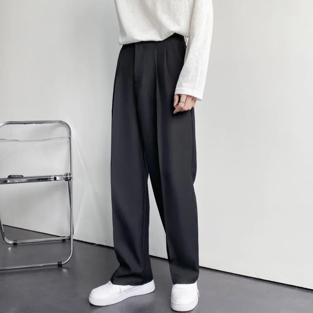 Stijlvolle oversized Paris pantalon voor heren, wit, met wijde pijpen, perfect voor een moderne outfit.