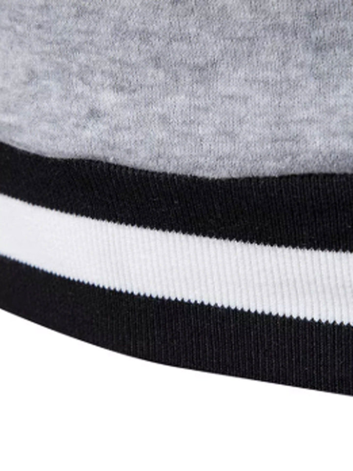 Trendy heren colourblock V-hals sweatshirt, ideaal voor een casual, warme en modieuze winterstijl.