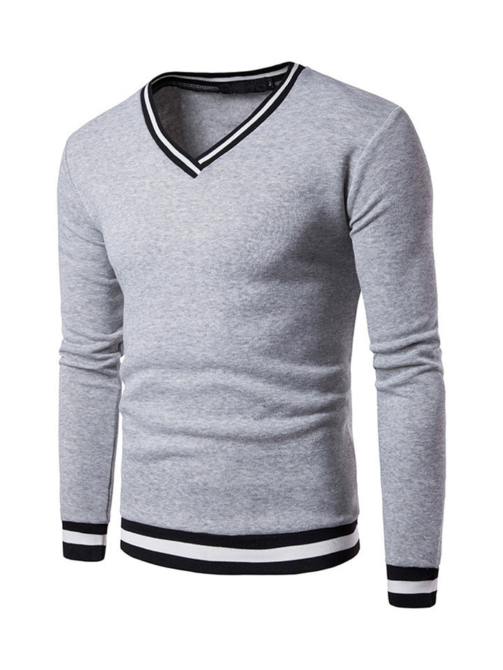 Modieus colourblock heren sweatshirt met V-hals, perfect voor casual wintermode. Comfortabel en stijlvol.