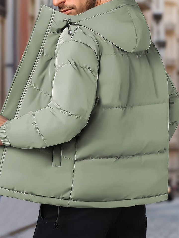 Zwart heren winterjack van katoenmix, winddicht en warm met een functionele capuchon.