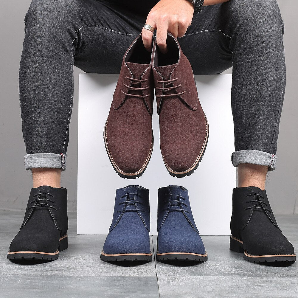 Zwarte leren heren enkellaarzen, stijlvol en veelzijdig voor casual en formele gelegenheden.