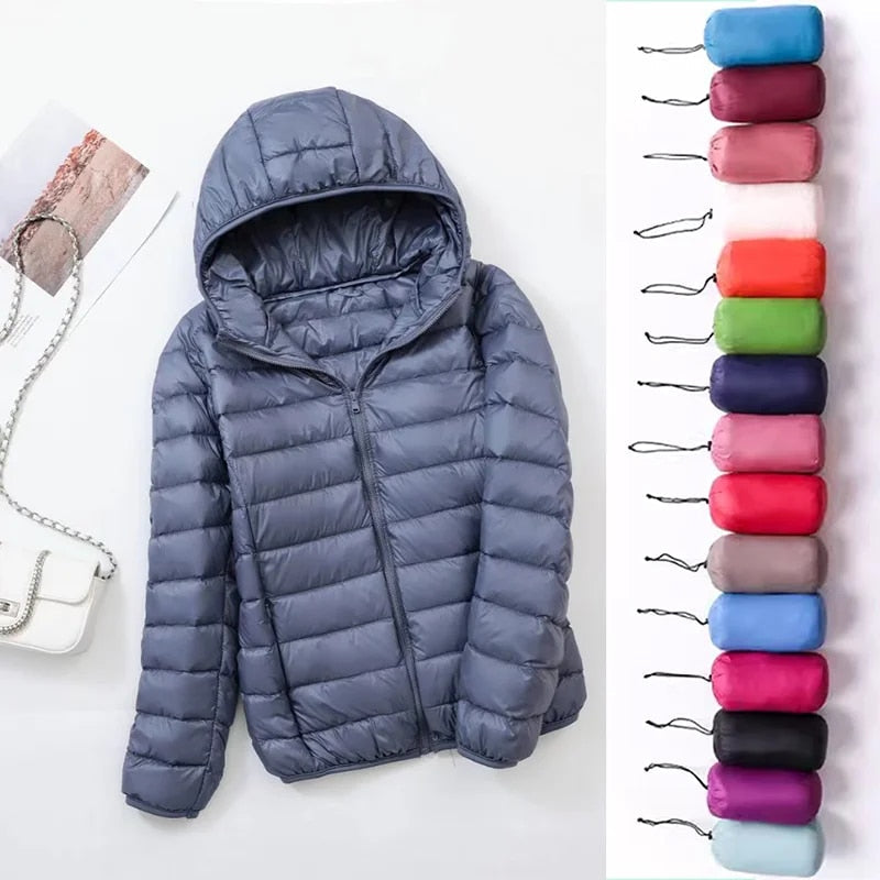 "Lichte donsjas dames met warme 80% eendendons vulling en capuchon, perfect voor herfst en winter, stijlvol ontworpen."