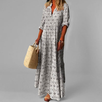 "Lichte katoenen maxi jurk met V-hals, 3/4 mouwen en vintage print voor dames, ideaal voor zomerse elegantie."