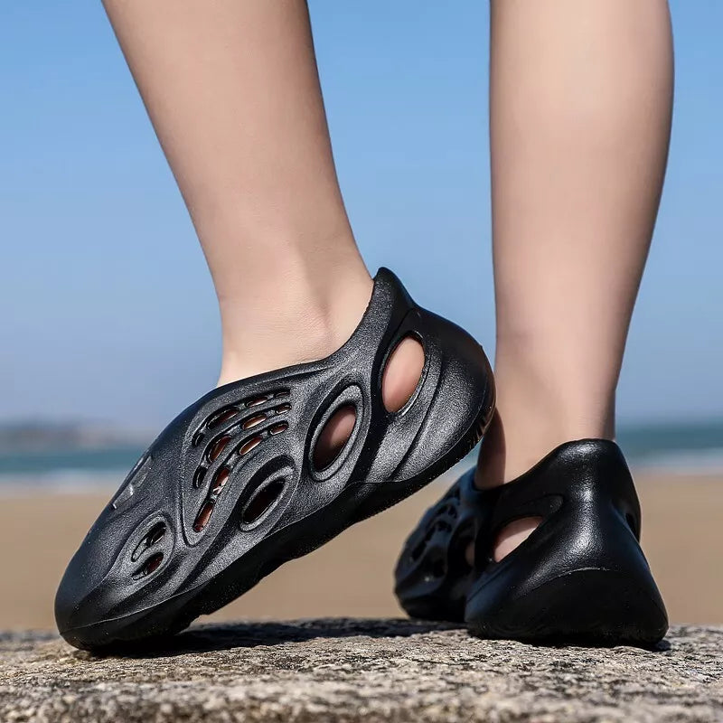 "Lichtgewicht EVA foam slippers voor heren, schokabsorberend en modern ontwerp, ideaal voor zomer en thuisgebruik."