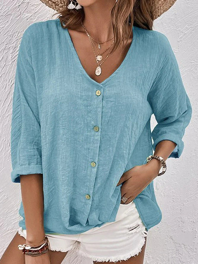 Lichtgroen linnen zomershirt voor dames met losse pasvorm en luchtige uitstraling, perfect voor warme dagen.