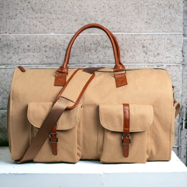Zijaanzicht van de vintage Simona reistas, toont compact design en stijlvolle afwerking. Unisex schoudertas.
