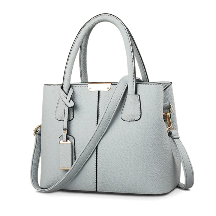 Praktische veelzijdige dames tas, te dragen als crossbody of comfortabele schoudertas.