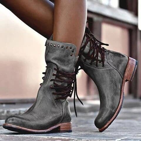 Elegante halfhoge dameslaarzen in vintage stijl, perfect voor een stijlvolle retro look. Comfortabele en veelzijdige schoenen.