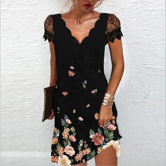 "Livia zomerjurk met kanten mouwen en v-hals, elegante patronen en vrouwelijke details voor stijlvolle zomerse look"