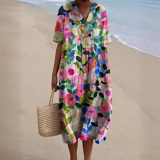 Lotte zomerjurk met bloemenprint en V-hals, elegante en luchtige damesjurk die comfort en stijl biedt voor zomerse dagen.