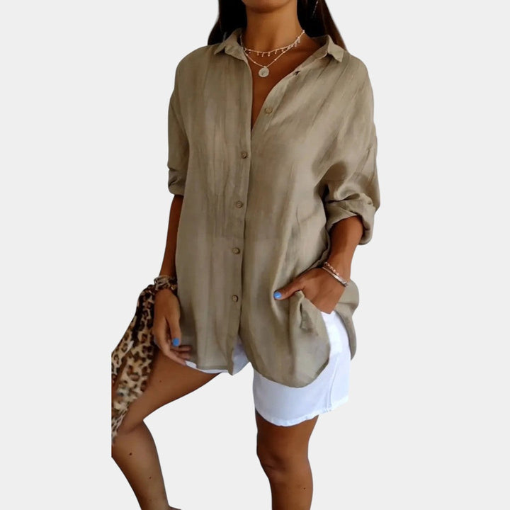 Elegante klassieke damesblouse met lange mouwen, geschikte werkkleding, tijdloze mode voor de zomer.