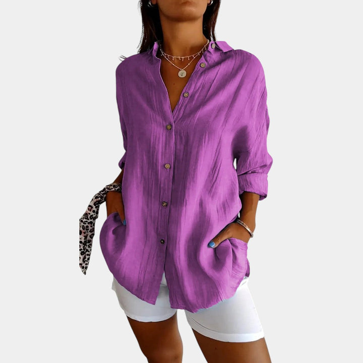 Comfortabele effen damesblouse met lange mouwen, zachte stof, ideaal voor lente en zomer.