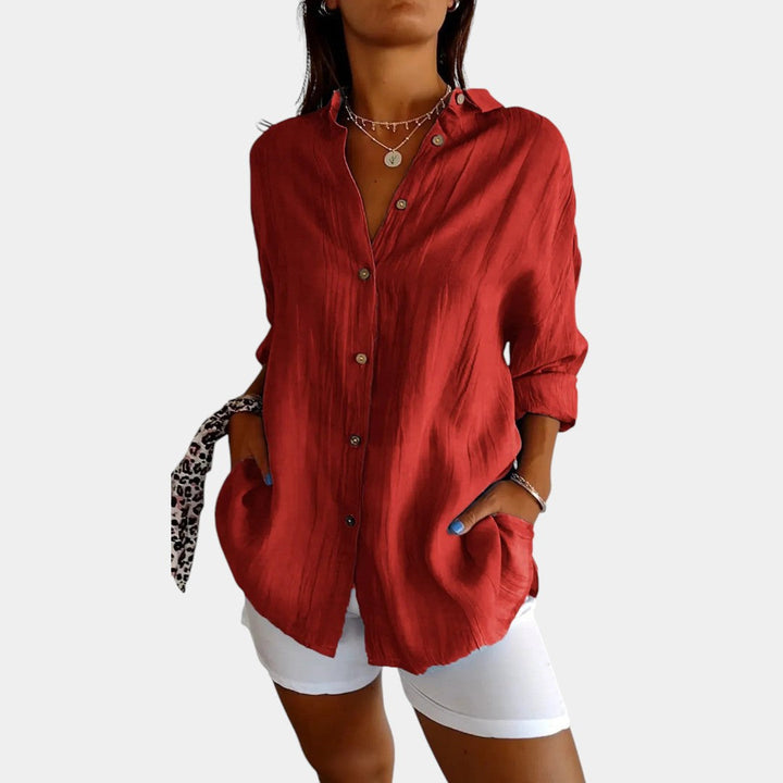 Tijdloze elegante damesblouse met lange mouwen, effen design, essentieel comfort voor elke garderobe.