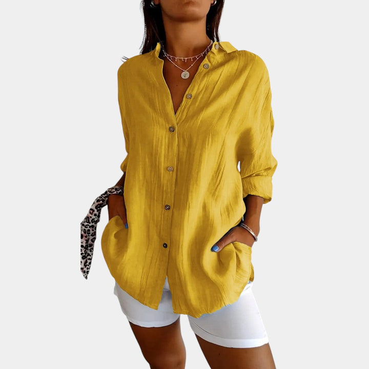 Veelzijdige damesblouse met lange mouwen voor casual styling, perfect voor een comfortabele lentedag.