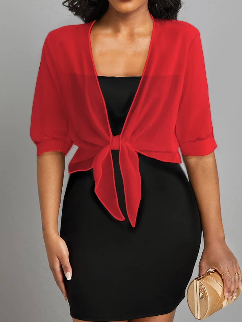 "Luchtige elegante damesblouse met open voorkant, frisse charmante look, perfect voor zonnige dagen."