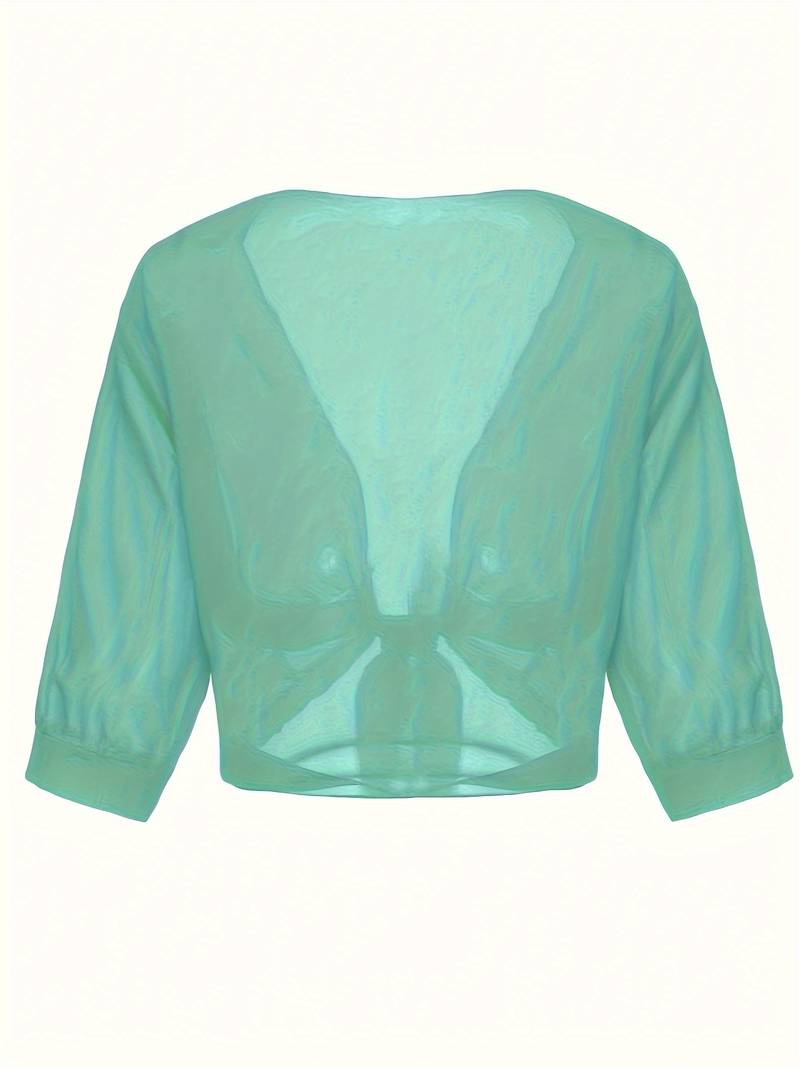 "Luchtige elegante damesblouse met open voorkant, frisse charmante look, perfect voor zonnige dagen."