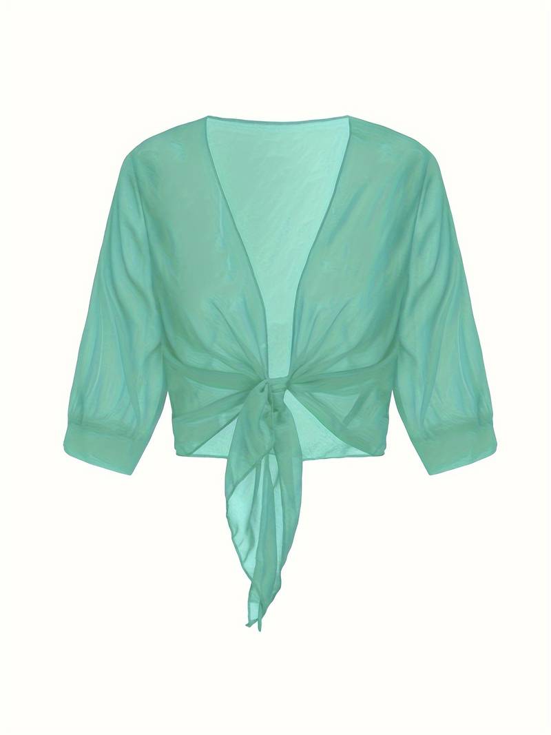 "Luchtige elegante damesblouse met open voorkant, frisse charmante look, perfect voor zonnige dagen."