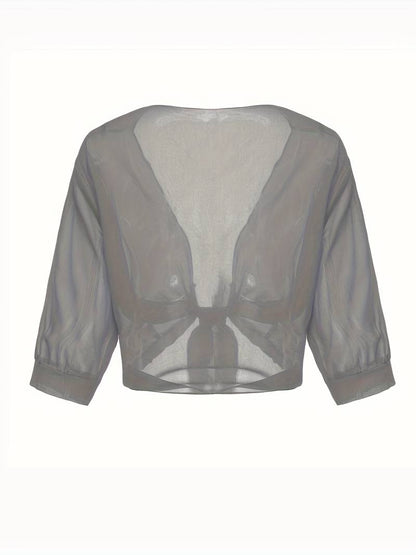 "Luchtige elegante damesblouse met open voorkant, frisse charmante look, perfect voor zonnige dagen."