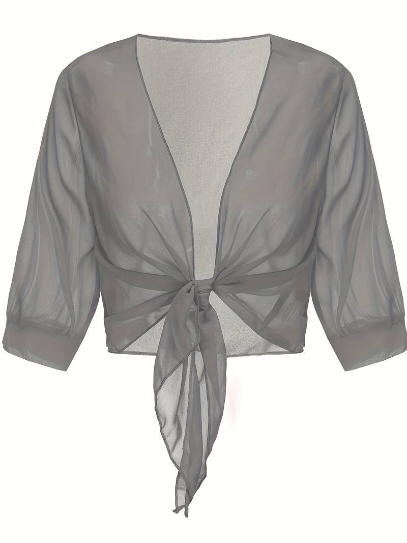 "Luchtige elegante damesblouse met open voorkant, frisse charmante look, perfect voor zonnige dagen."